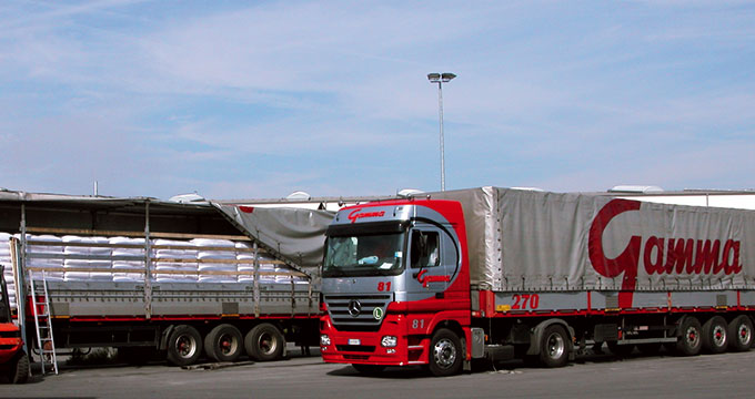 a red and silver semi truck